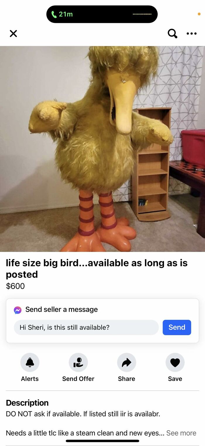 Life-size big bird costume listed on Facebook Marketplace with worn fur and large orange striped feet for sale.