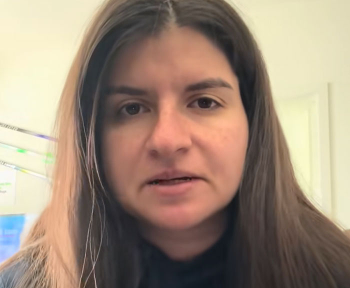 A woman with long brown hair speaking in a neutral setting, representing epic PR fails examples.