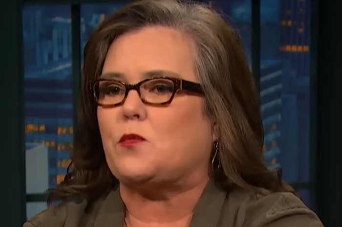 Woman with glasses and gray hair speaking during a televised interview about epic PR fails.