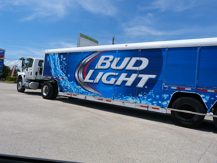 Bud Light branded delivery truck parked outdoors under blue sky, representing an epic PR fail concept.