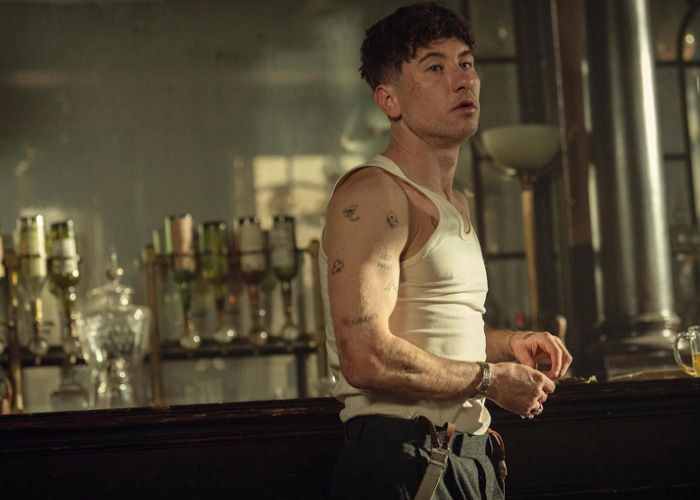 Barry Keoghan in a sleeveless shirt at a bar, reflecting on his acting career amid backlash from fans. Barry Keoghan in a sleeveless shirt at a bar, reflecting on his acting career amid backlash from fans.