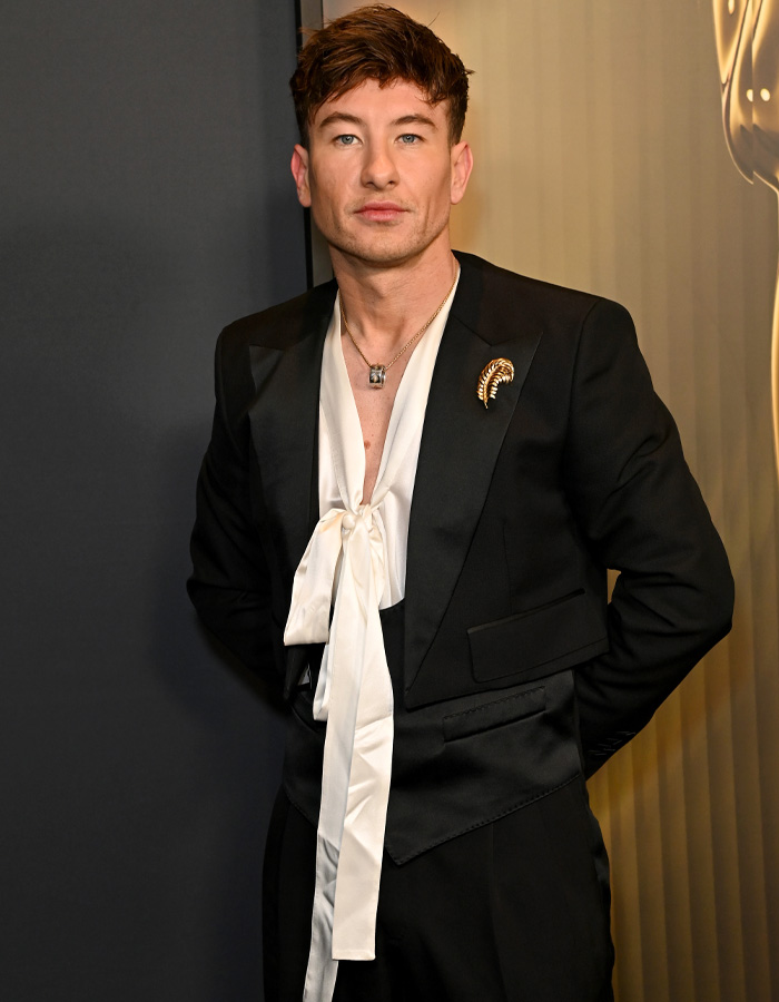 Barry Keoghan in a black suit with a white satin tie detail, posing at an event amid acting career reconsideration and fan backlash. Barry Keoghan in a black suit with a white satin tie detail, posing at an event amid acting career reconsideration and fan backlash.