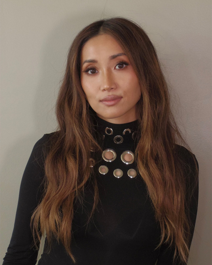 Brenda Song looking serious in black top highlighting her experience with airline separating her from kids during flight Brenda Song looking serious in black top highlighting her experience with airline separating her from kids during flight