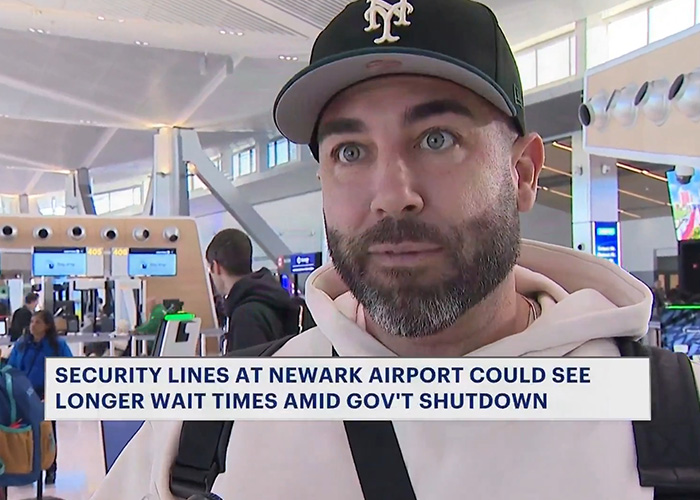 Brooklyn man at airport showing priceless reaction to ICE amid security line delays during government shutdown.
