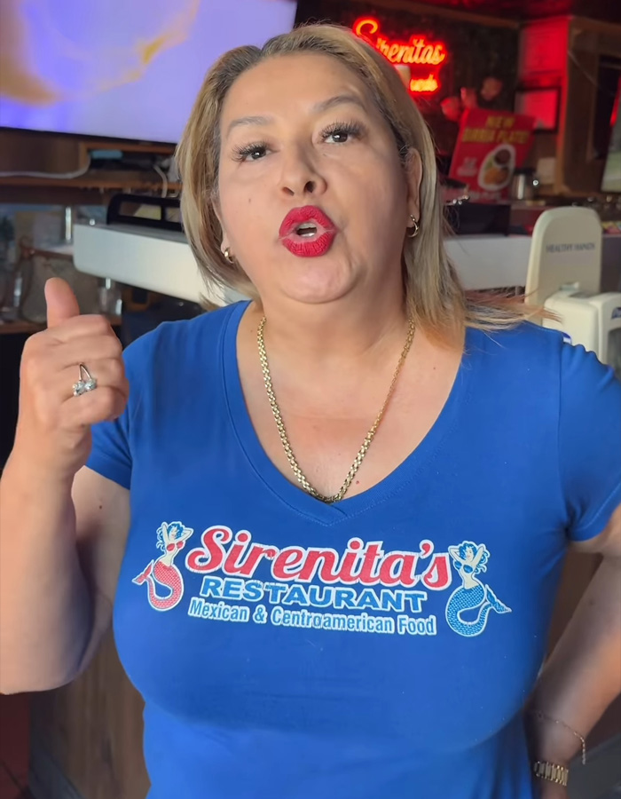 Waitress at Sirenita's Restaurant reacting, involved in controversy over Spanish racial slur, amid customer complaint and review b**b.