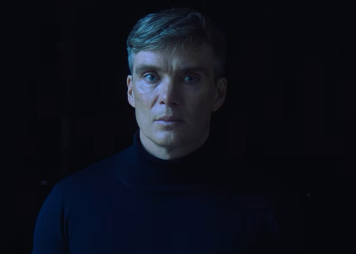 Cillian Murphy looking serious in a dark turtleneck, sparking debate about his appearance and aging.