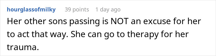 Man caring for his baby at night, looking tired while his worried mom watches him closely.