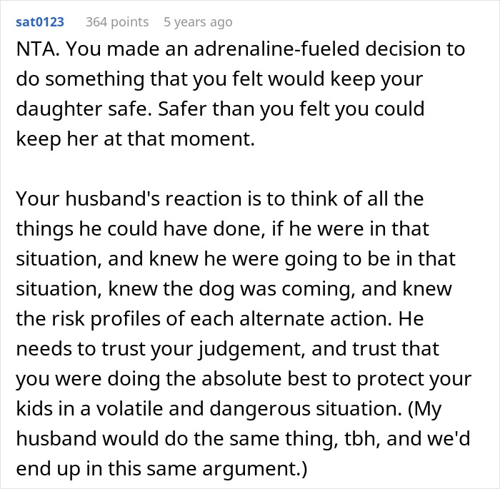 wife and twin girls running near fence chased by dog in a protective and urgent moment outdoors