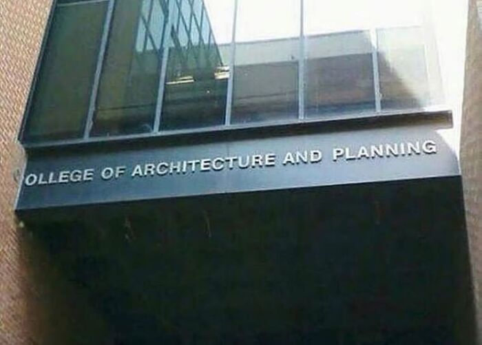 Building facade with a missing letter in the sign for College of Architecture and Planning, a weird and cringey photo.