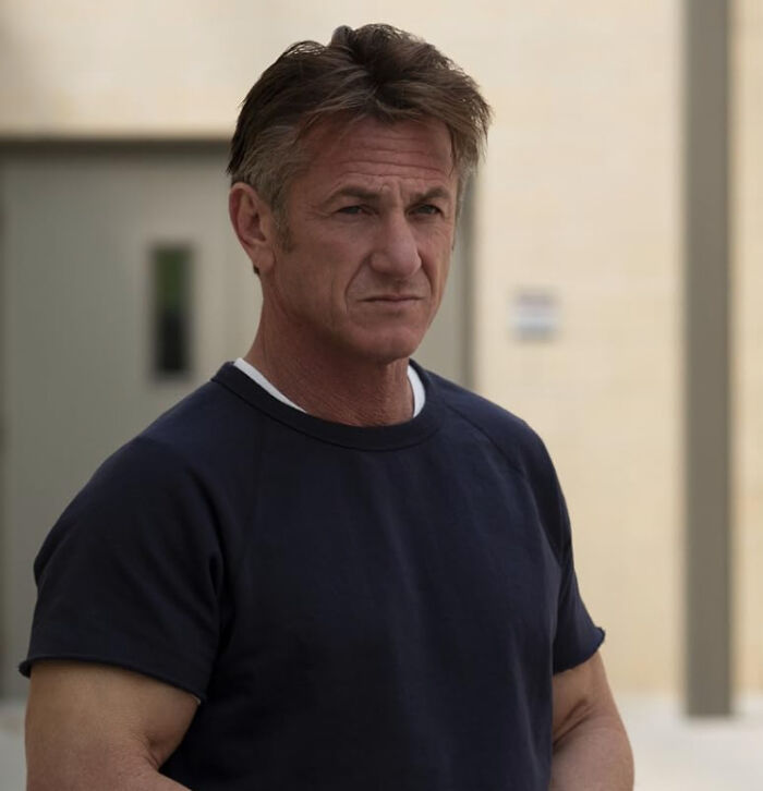 Middle-aged man looking serious outdoors, illustrating celebrities people used to like but now wholeheartedly hate.