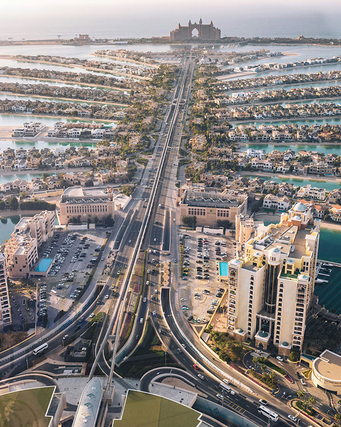 Aerial view of Dubai showing luxury residences and roads, highlighting the harsh reality of Dubai labor camps.
