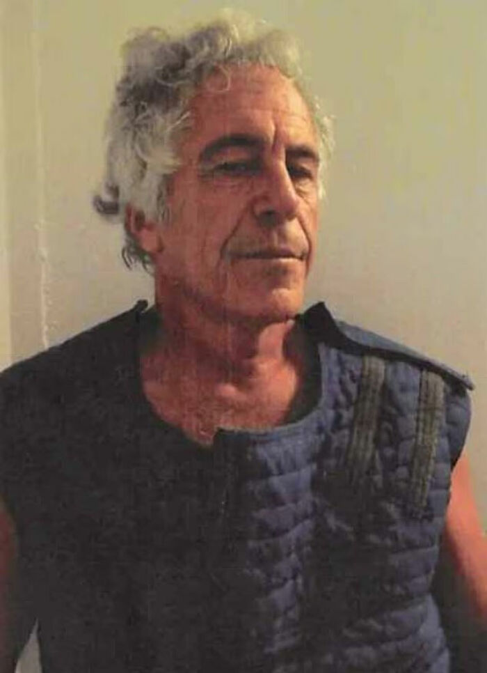Man with gray curly hair wearing a padded vest, related to Epstein prison guard googled his name before passing story.