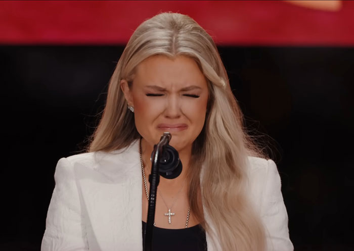 Erika Kirk reacting emotionally during her latest video, sparking massive backlash for lacking a genuine bone in her body.