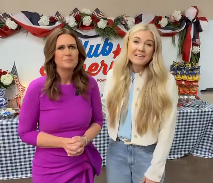 Two women standing in front of a patriotic backdrop, related to Erika Kirk's latest video backlash discussion.