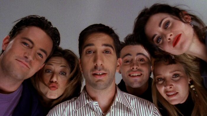 Main cast of Friends in a selfie-style group shot, perfect for fans to test their knowledge with 35 questions.