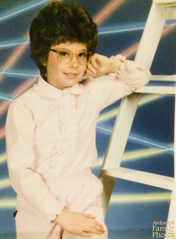 Vintage school picture with awkward pose and retro glasses, capturing a classic example of funny school picture day fails.
