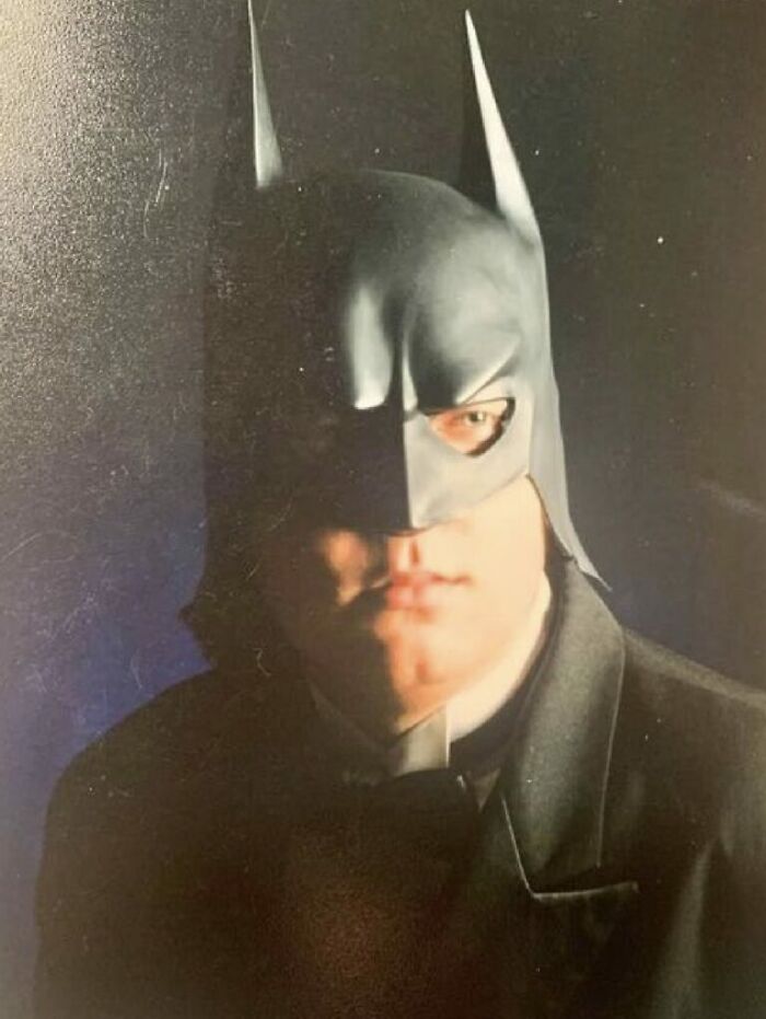 Student wearing a Batman mask for a school picture day, showcasing a funny school picture day fail moment.