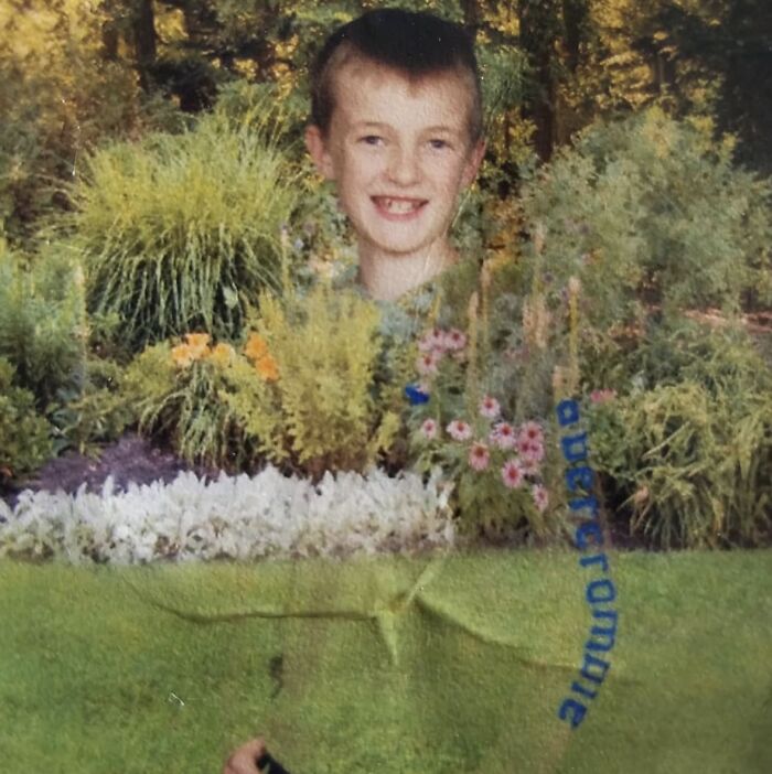 Boy’s school picture day photo with a misaligned double exposure creating a funny school picture day fail effect.