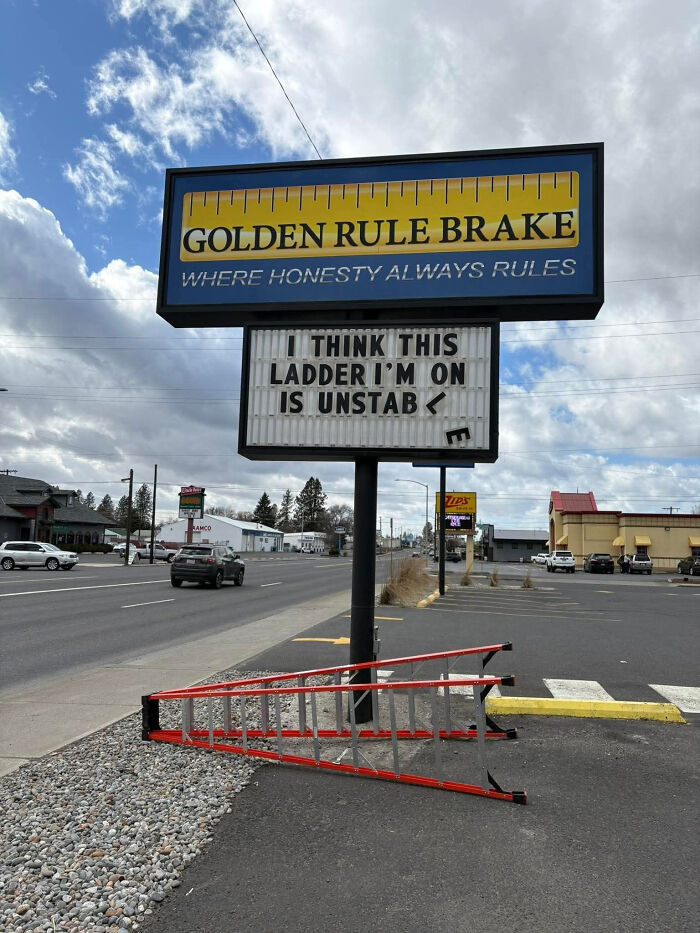 Funny sign outside Golden Rule Brake shop shows unstable ladder, making people laugh and do a double take on humor signs.