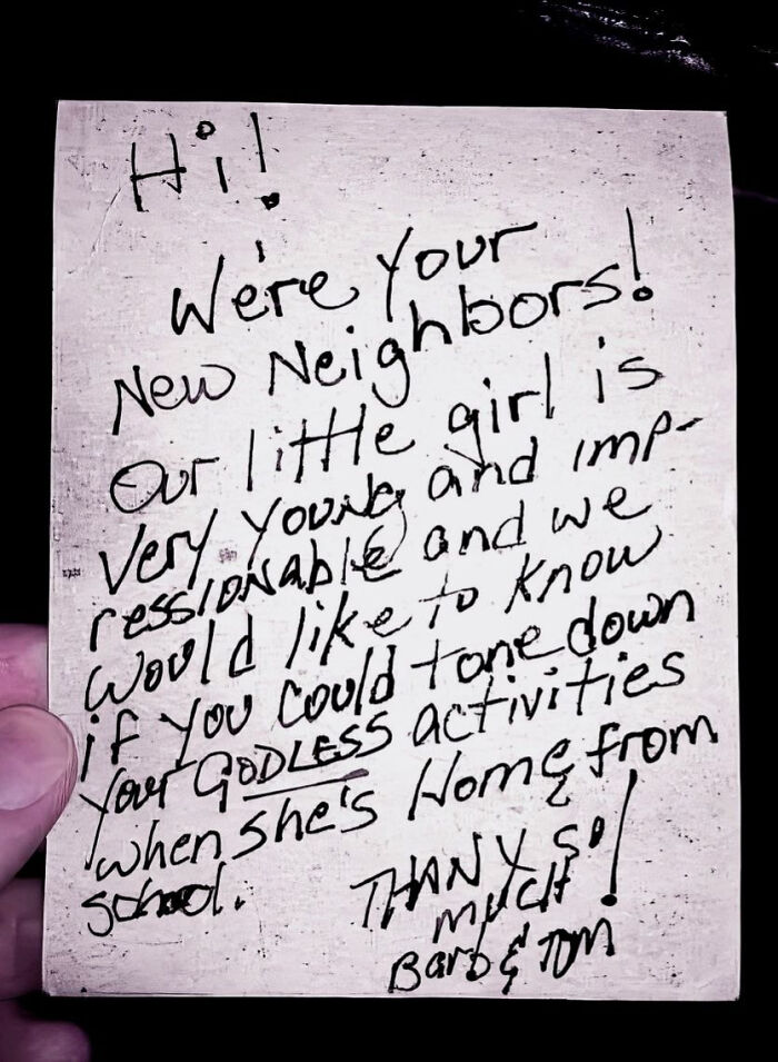 Handwritten note from new neighbors asking to tone down godless activities, one of the signs that made people laugh or do double takes.