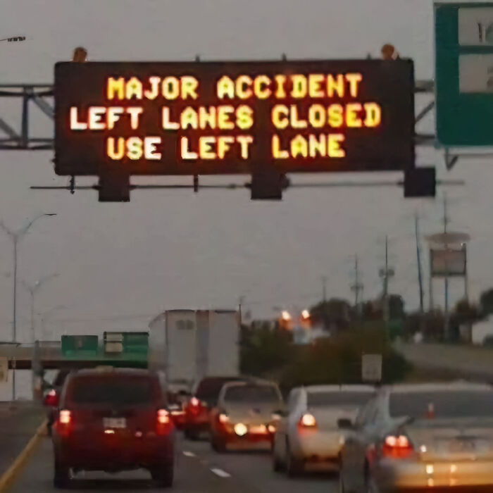 Highway sign displays major accident with left lanes closed, creating a funny or surprising traffic moment for drivers.