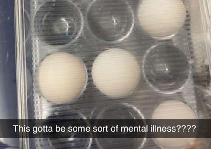Eggs placed in an egg tray with empty slots, illustrating seemingly harmless things partners do that drive others insane.