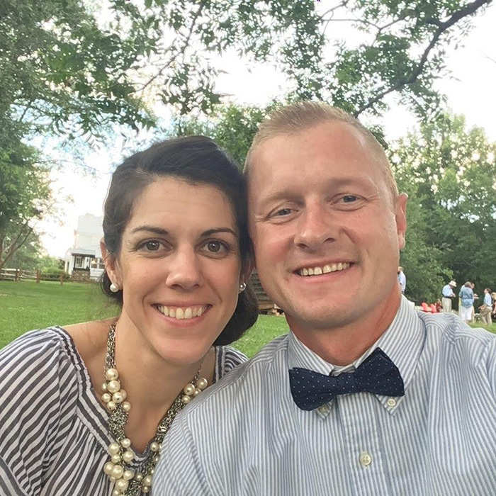 Couple smiling outdoors with trees in background, related to teacher loses his life after prank incident news.