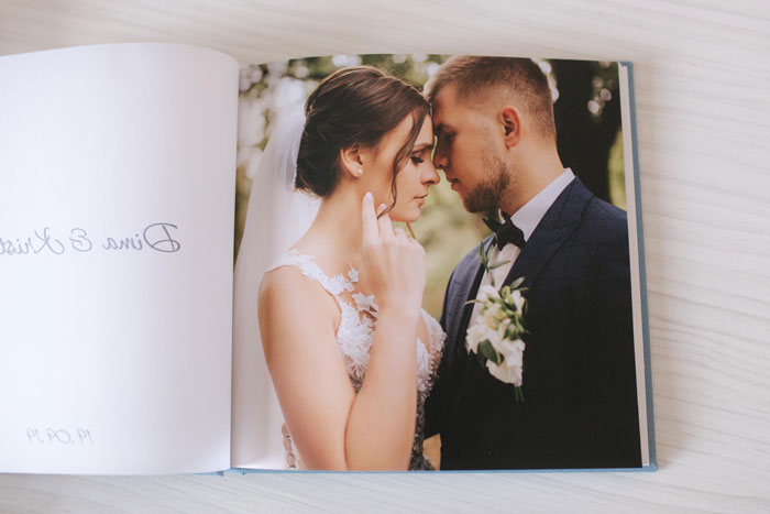 Wedding photo album shows bride and groom in intimate moment, highlighting mental health strain pushing wife to the edge.