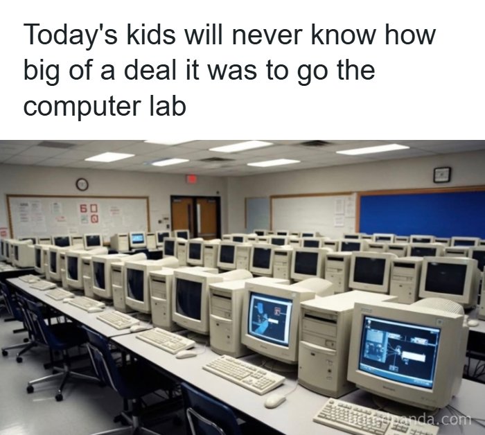 Rows of old desktop computers in a 90s computer lab, showcasing parts of our lives that don’t exist anymore.