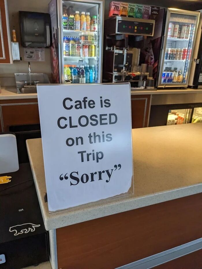 Sign with suspicious quotation marks on cafe closure message, creating a hilariously confusing impression.