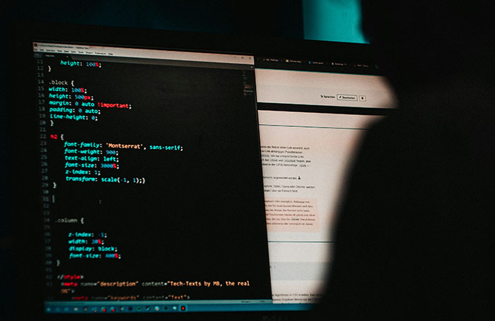 Computer screen displaying code and text, illustrating common fake facts people believed only because of movies.