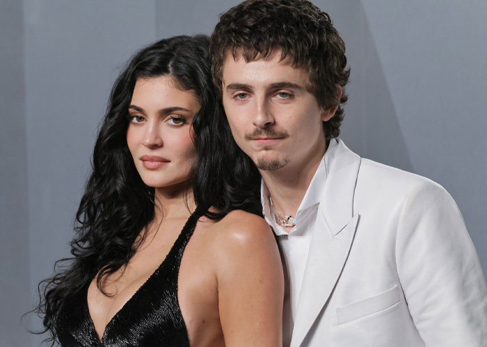 Timoth&eacute;e Chalamet and woman posing together at event, highlighting awkward Oscars night and message from Kylie Jenner&rsquo;s ex.