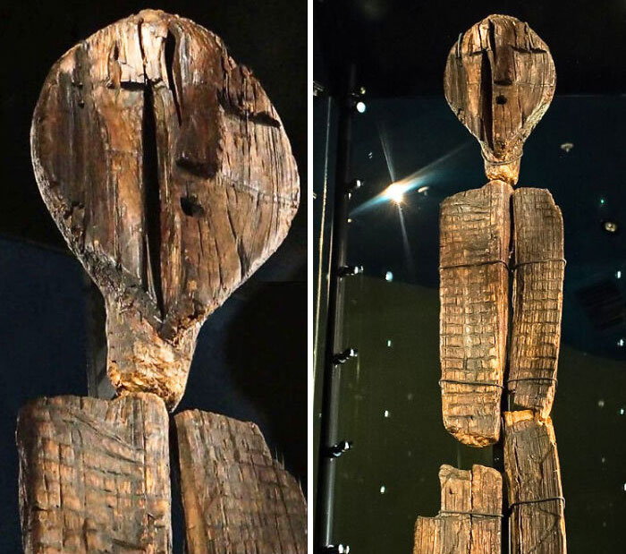 Ancient wooden statue with a carved humanoid figure, showcasing strange earth artifacts that seem borderline unbelievable.