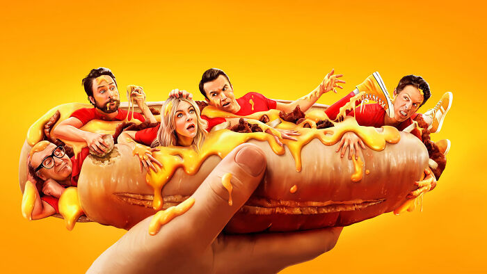 Actors snuggled inside a giant cheesy hot dog, representing popular TV shows with episodes removed from streaming platforms.