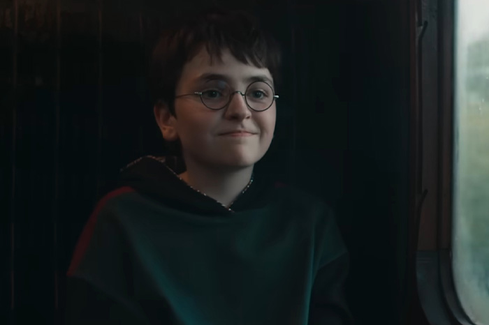 Young boy dressed as Harry Potter sitting by a window, representing the Harry Potter reboot amid backlash discussion. Young boy dressed as Harry Potter sitting by a window, representing the Harry Potter reboot amid backlash discussion.