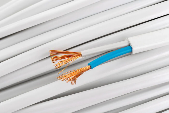 Coiled electrical cables with exposed copper wires, illustrating moments that made jurors lose faith in the justice system.