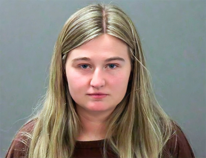 Mugshot of Kendra Duggar with long blonde hair and neutral expression, taken after arrest on criminal charges in Arkansas