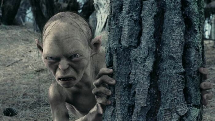 Gollum hiding behind a tree in a forest scene from Stephen Colbert’s new Lord of the Rings movie plot and timeline Gollum hiding behind a tree in a forest scene from Stephen Colbert’s new Lord of the Rings movie plot and timeline
