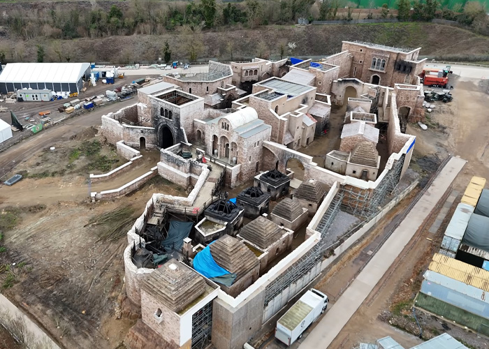 Aerial view of a detailed Harry Potter set captured by a drone revealing hidden filming area structures and layout.