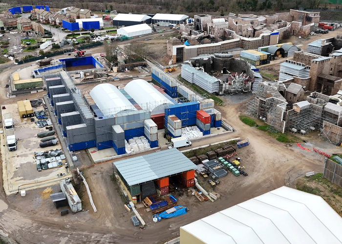 Aerial view of Harry Potter set under construction with tents and scaffolding, captured by drone revealing astounding details.