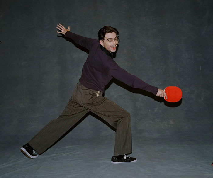 Young man playing table tennis indoors, illustrating acting legend&rsquo;s harsh insult over ballet and opera remark.