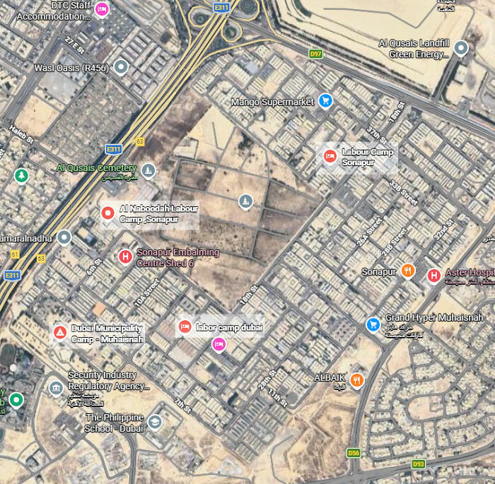 Aerial satellite map showing Dubai labor camps and surrounding streets in Sonapur area with labeled key locations.