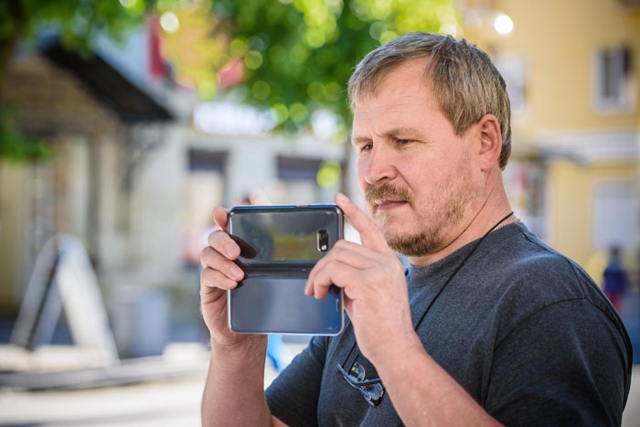 Woman Freaked Out By Shady Neighbor Constantly Filming Her, Finds Out He's A "Nuisance" Snitch