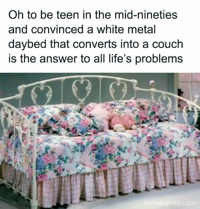 Floral daybed with white metal frame and plush toys, evoking millennial childhood nostalgia from the mid-nineties.