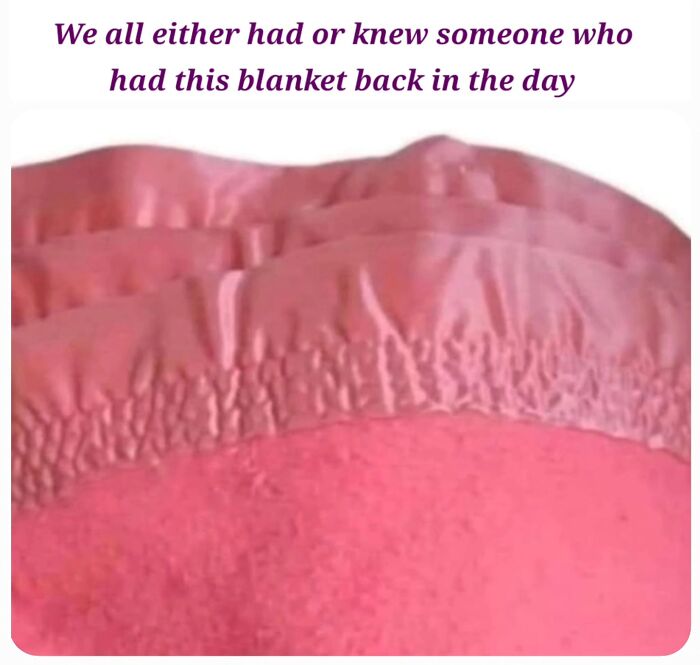 Pink vintage blanket with textured border, evoking nostalgia and instantly transporting millennials back to their childhood memories