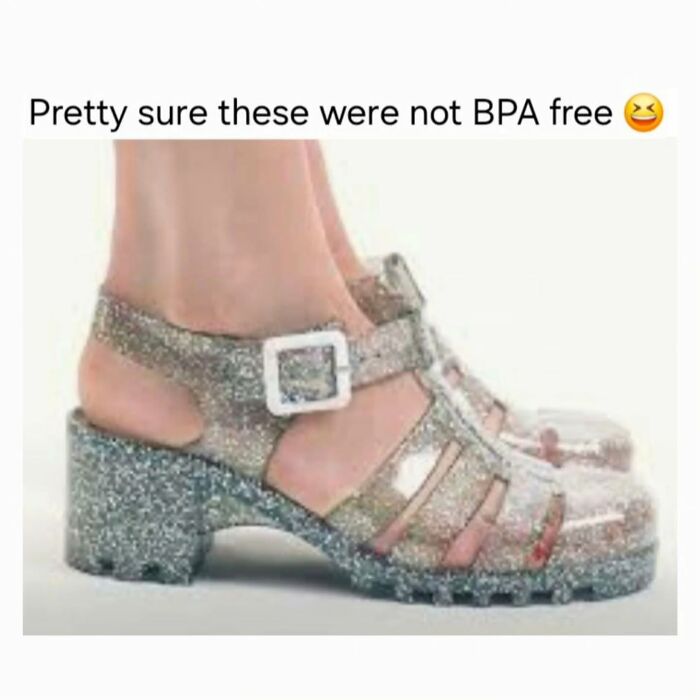 Glittery jelly sandals worn on feet, a nostalgic item that might instantly transport millennials back to their childhood.