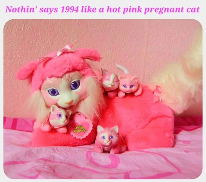 Hot pink pregnant cat toy with kittens, nostalgic 1990s design reminding millennials of childhood memories
