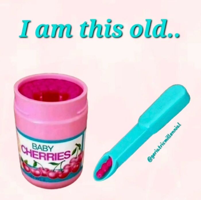 Baby cherries candy container with pink candy and blue scoop, nostalgic item transporting millennials back to their childhood.