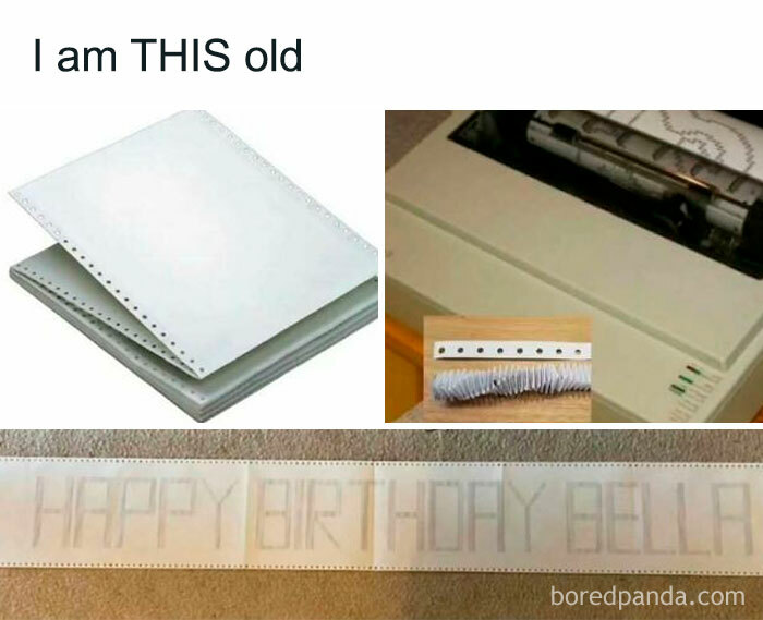 Stack of continuous feed computer paper, dot matrix printer printing birthday message, nostalgic millennial childhood memory.