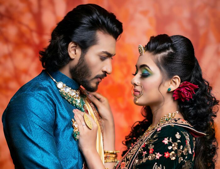 Couple in traditional attire representing cultural truths that have sadly vanished from people's home countries.